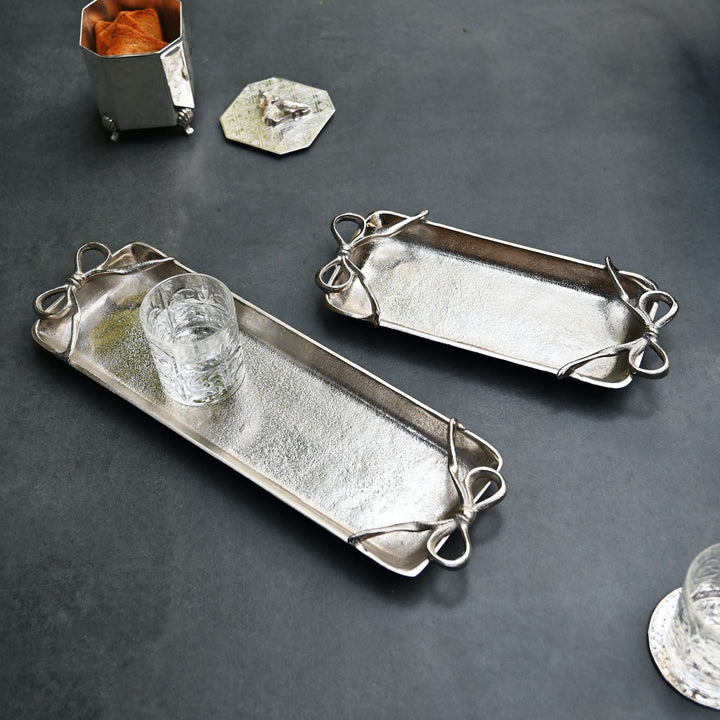 long silver tray with bow handles