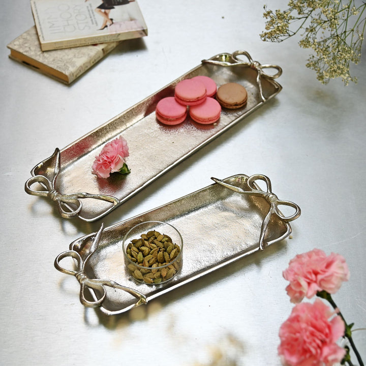 long silver tray with bow handles