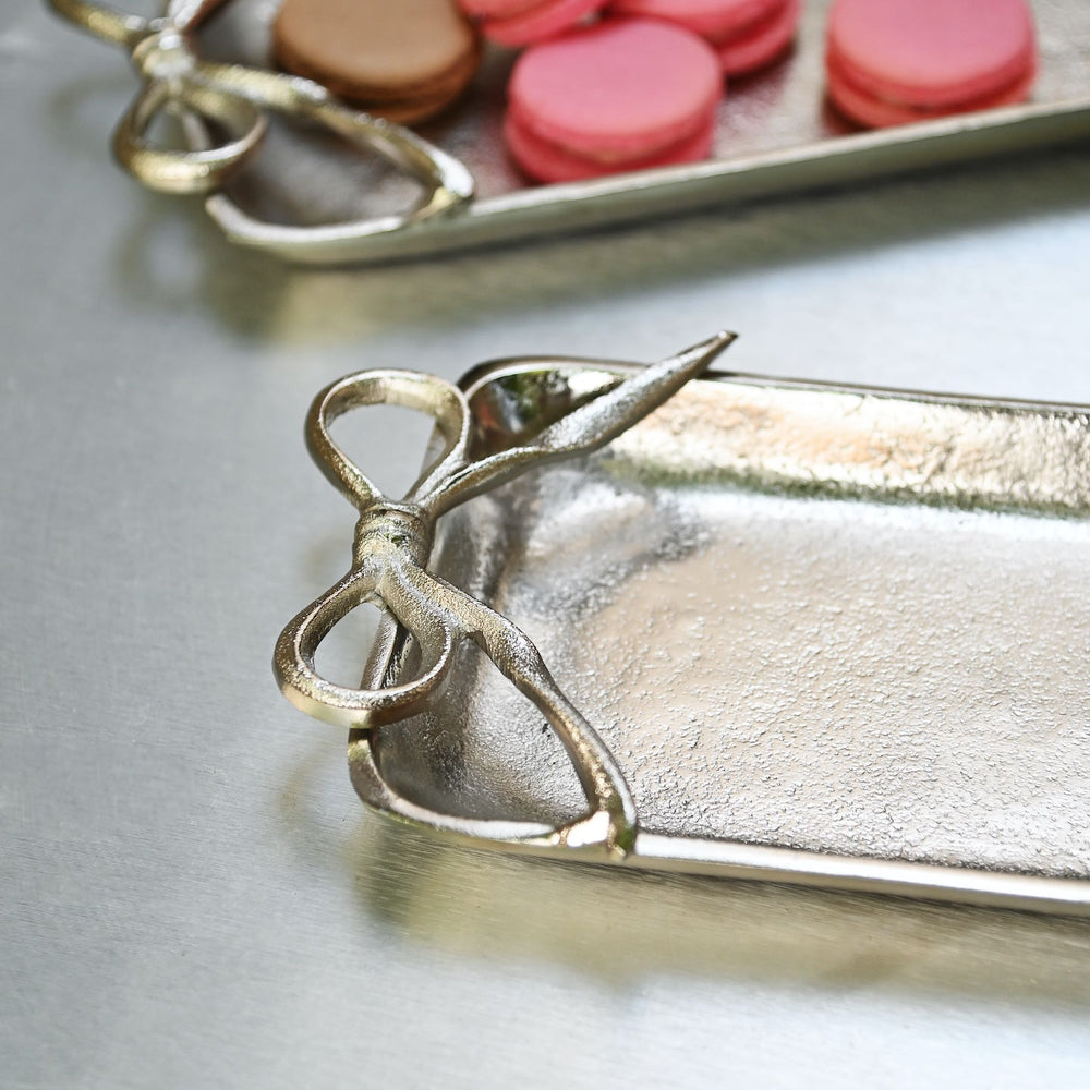 long silver tray with bow handles