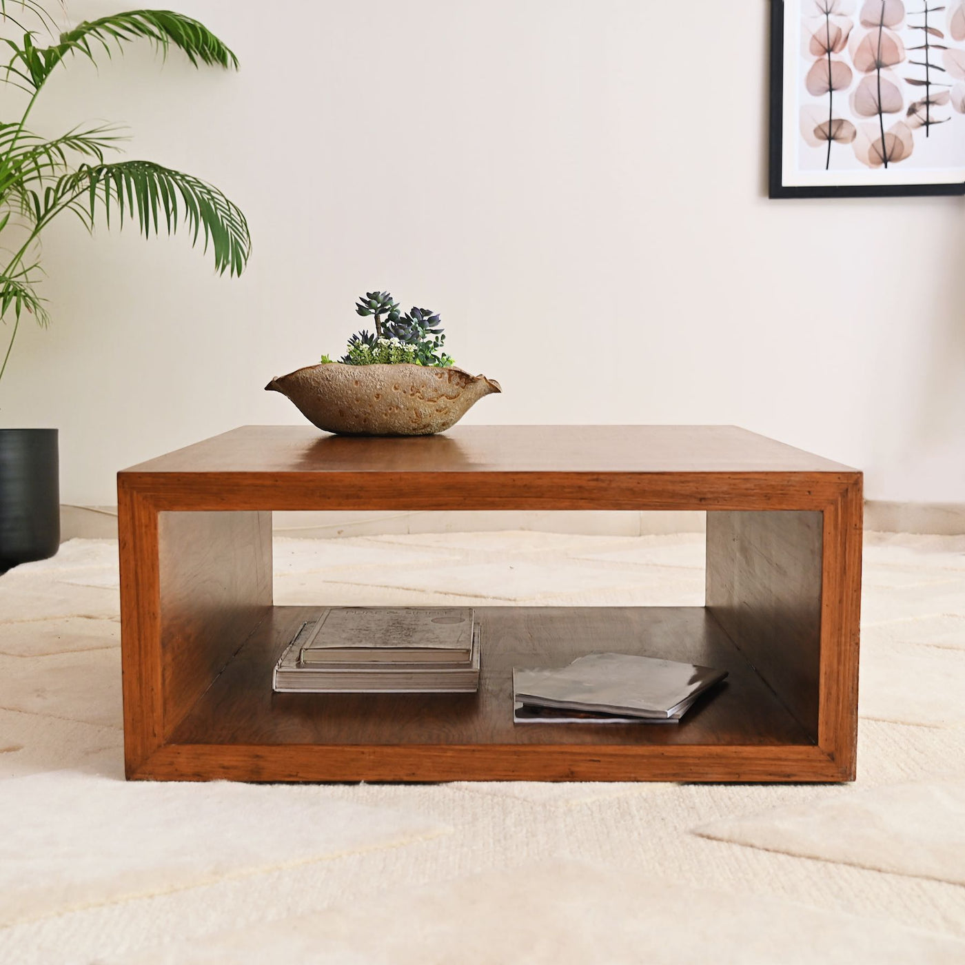 Teak wood coffee table with hollow storage space