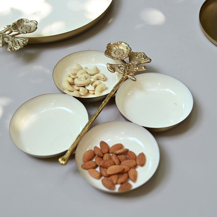 white & gold serving platter with four bowls