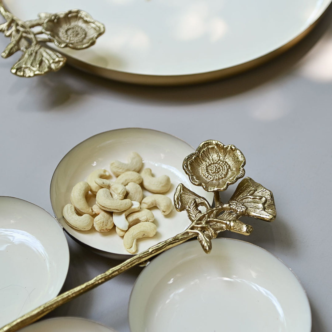 white & gold serving platter with four bowls