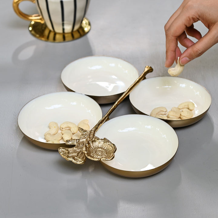 white & gold serving platter with four bowls