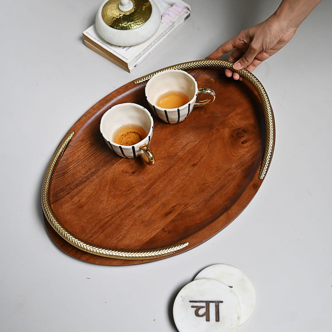 oval wooden tray with golden handles