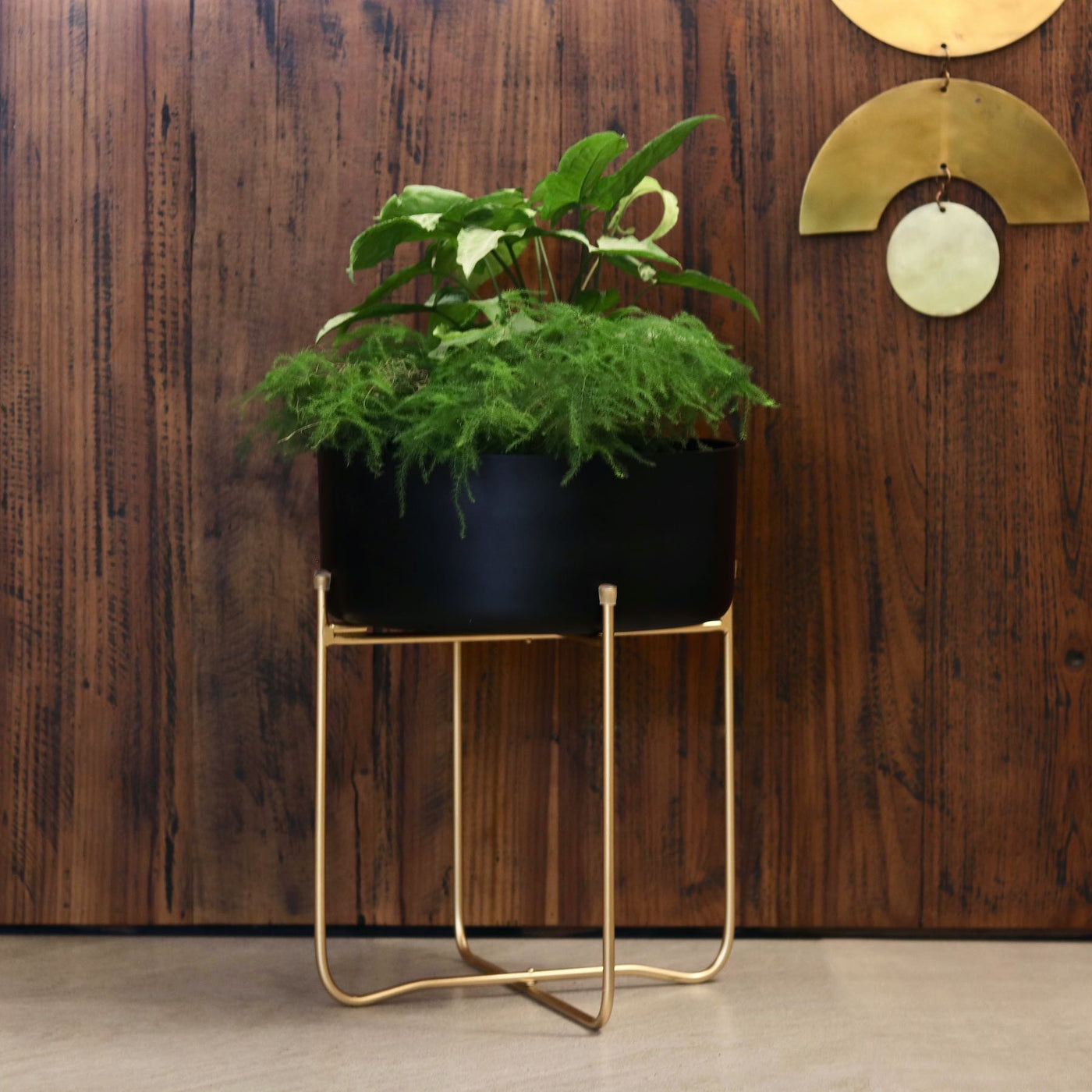 black metal planter with stand