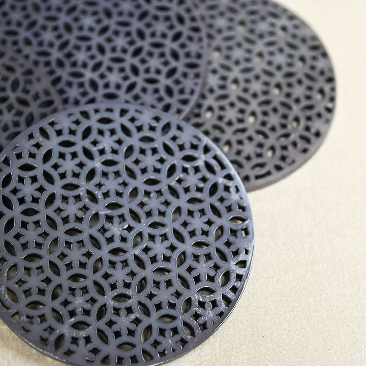 round black coasters with cutwork