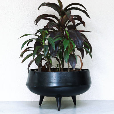 black tub metal planter with legs
