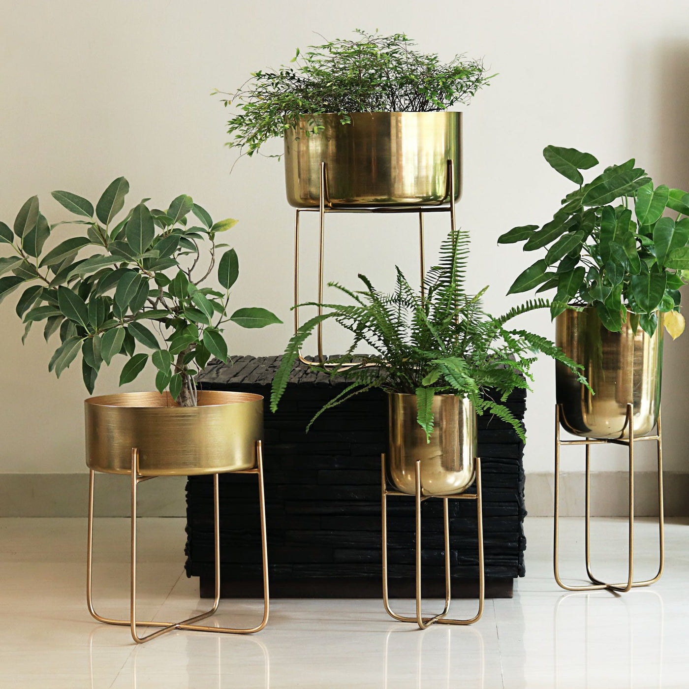golden brass planters with legs