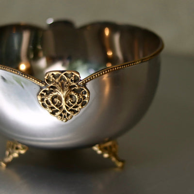 brass and steel serving bowl