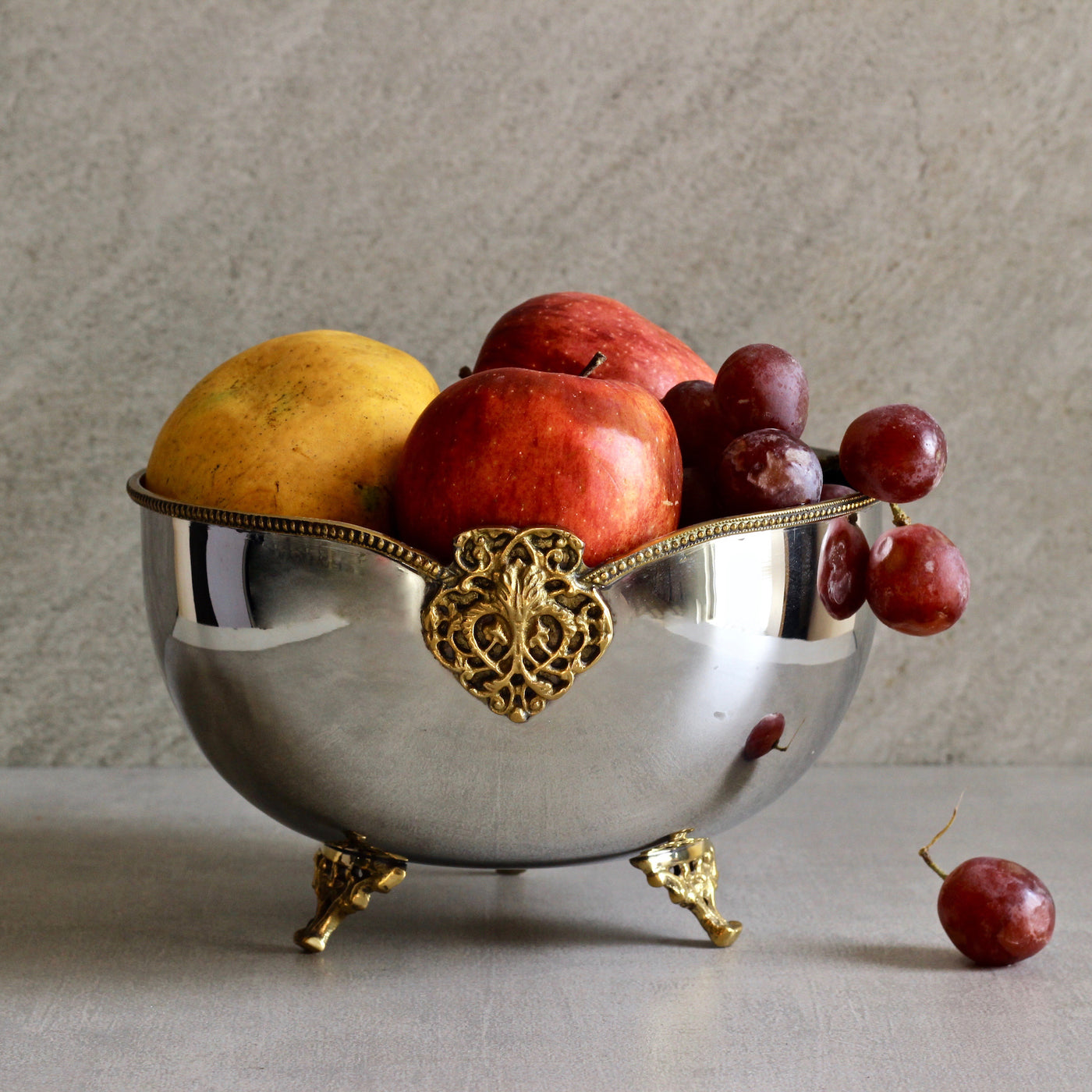 brass and steel serving bowl