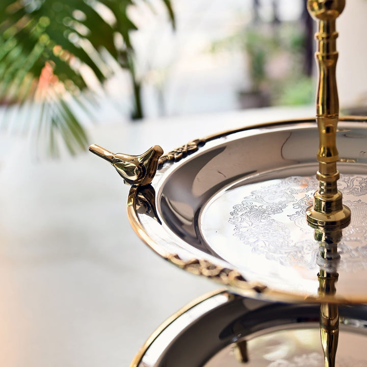 tiered serving platter made of stainless steel and brass