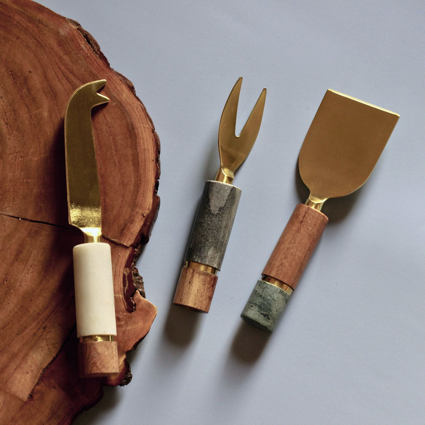 brass and wood cheese knife set