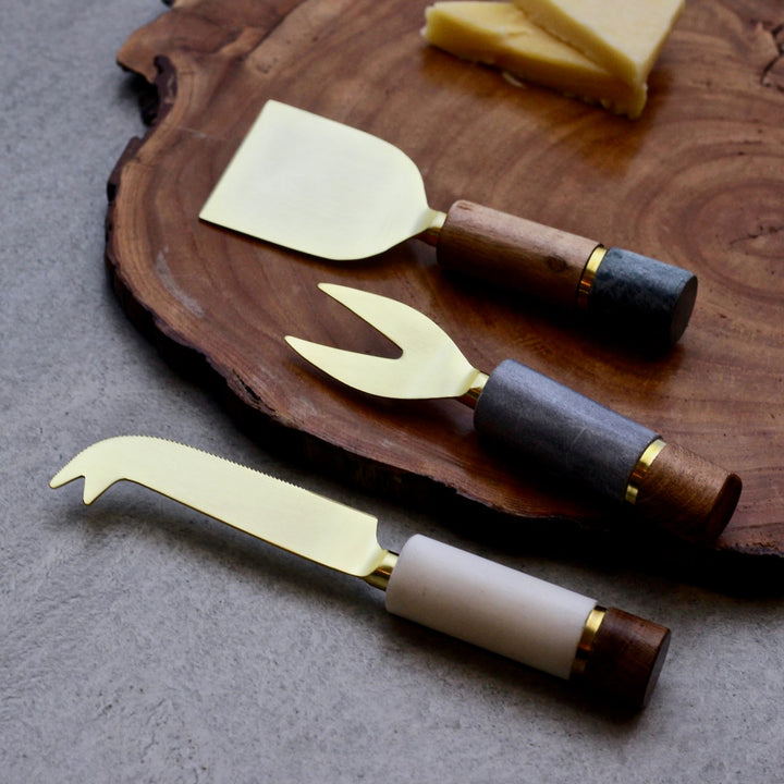 brass and wood cheese knife set