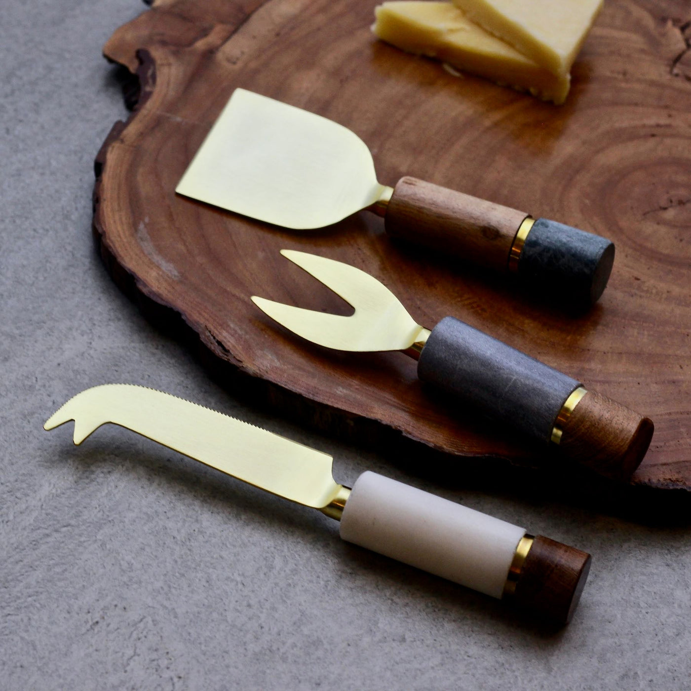 brass and wood cheese knife set
