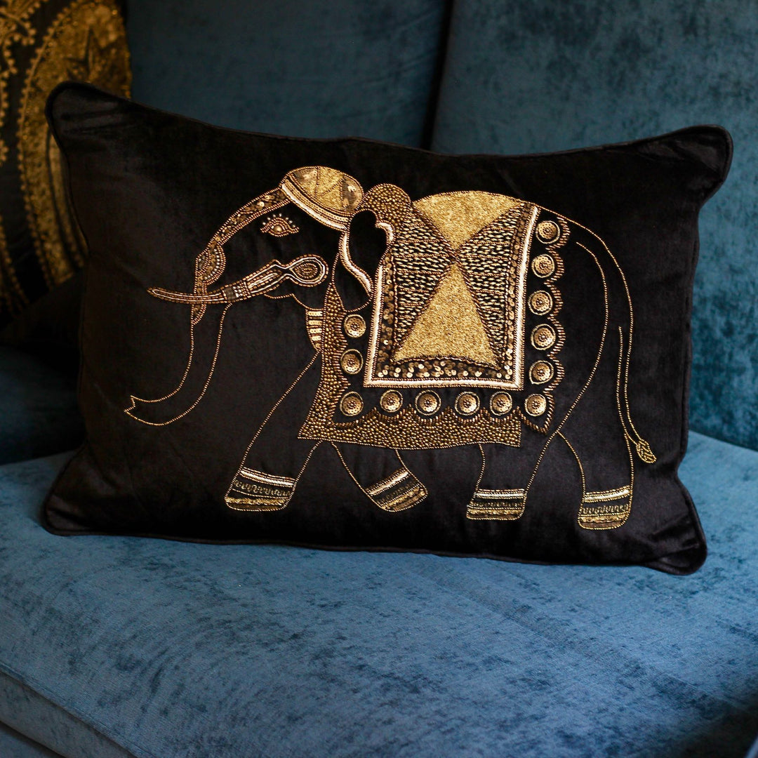 black velvet sofa cushion with golden embroidered elephant design