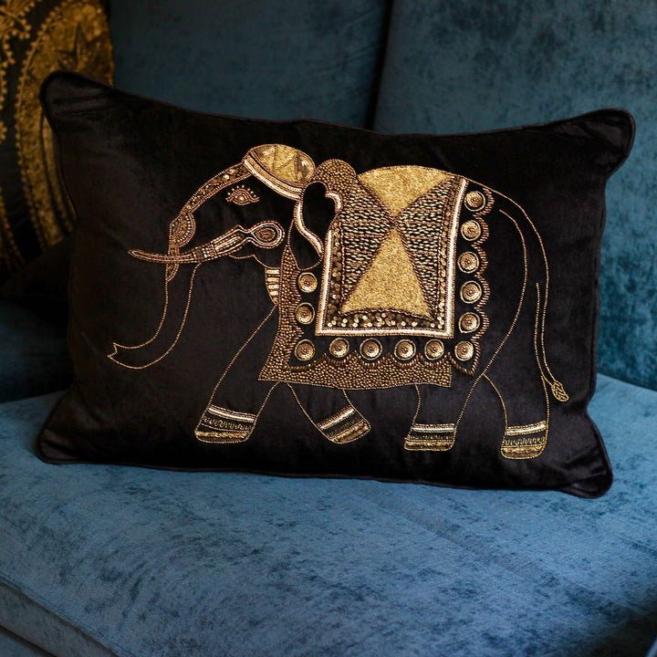black velvet sofa cushion with golden embroidered elephant design