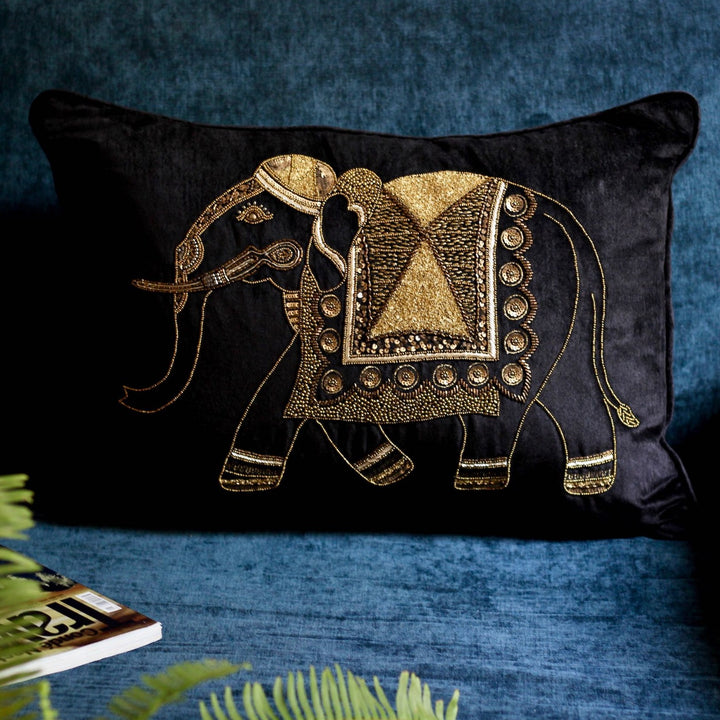 black velvet sofa cushion with golden embroidered elephant design