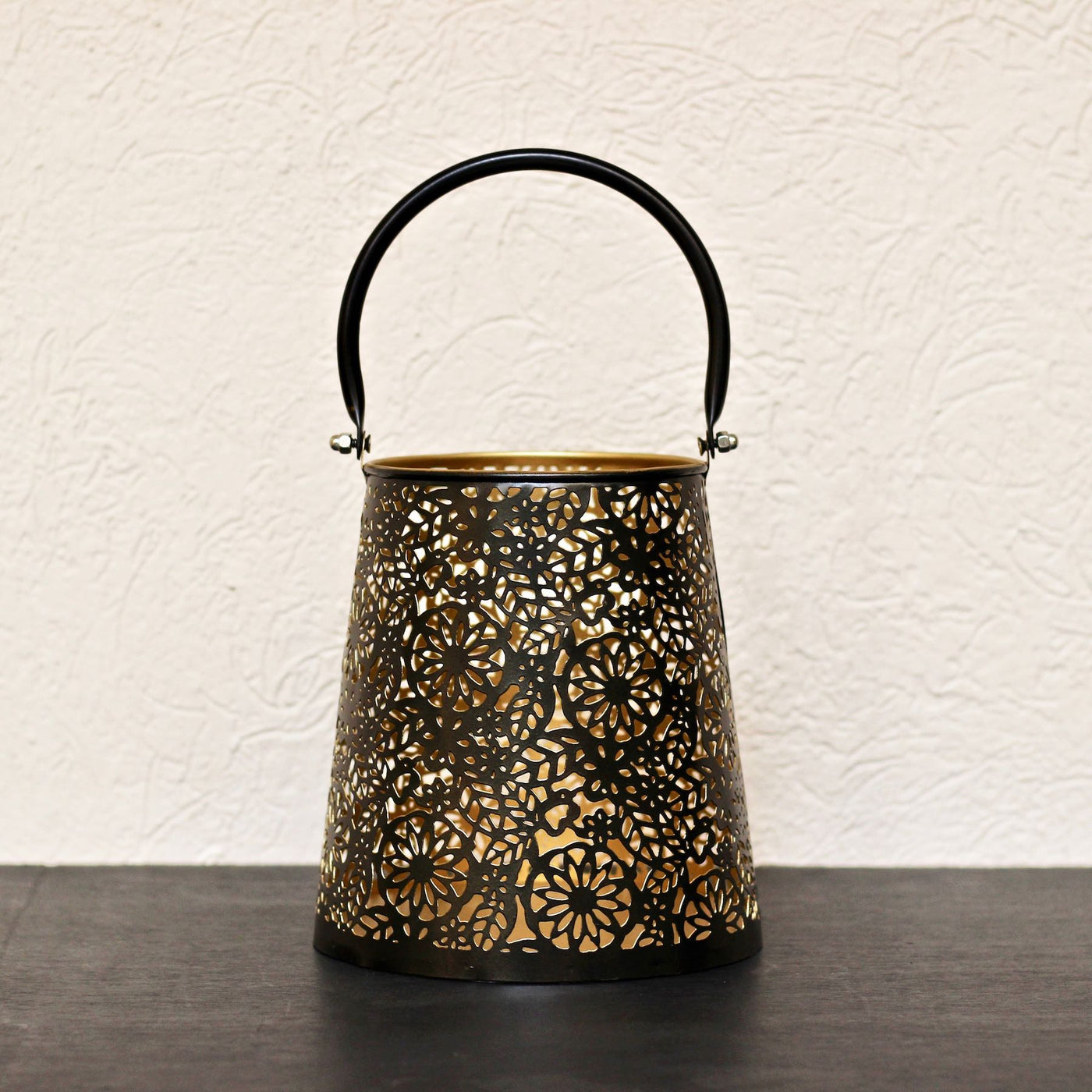 black and golden lantern with cutwork