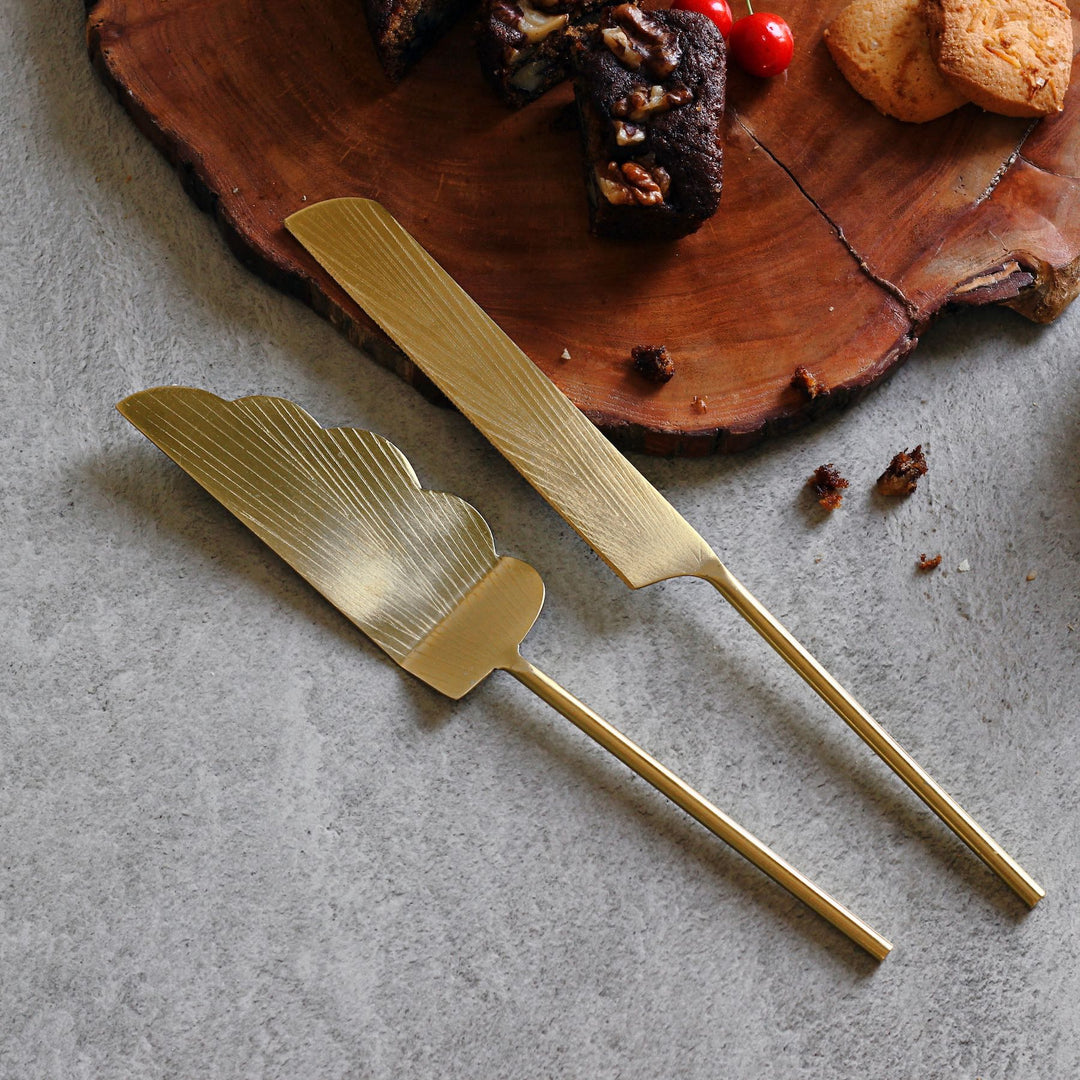 gold cake server and knife