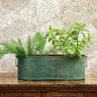 green long metal pot