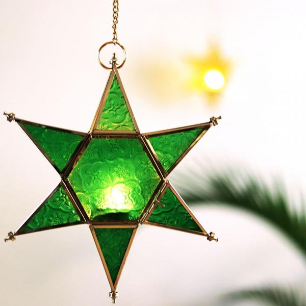 star shaped brass and glass green t light holders
