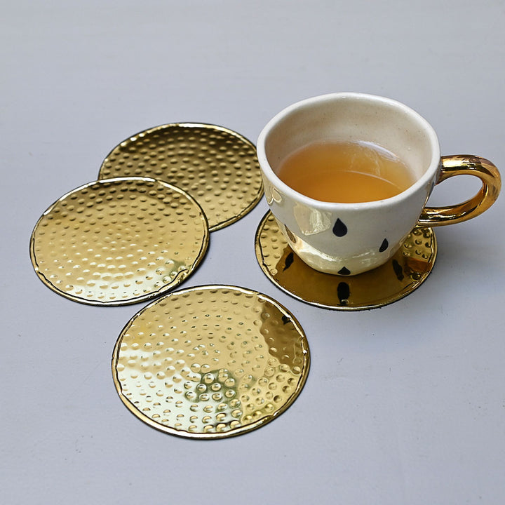 gold round metal coasters set