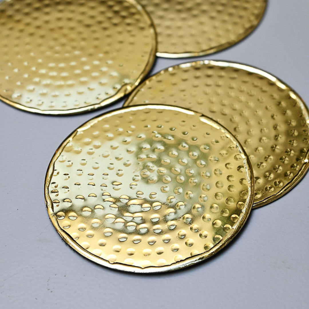 gold round metal coasters set