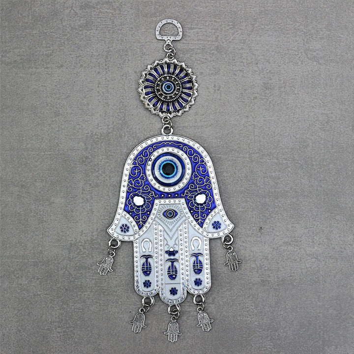 hamsa Turkish evil eye made of blue glass and metal