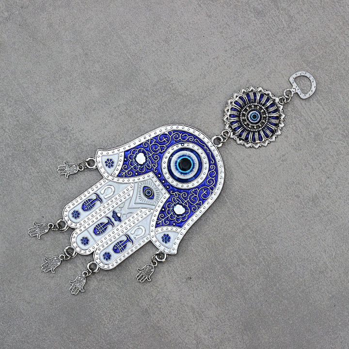 hamsa Turkish evil eye made of blue glass and metal