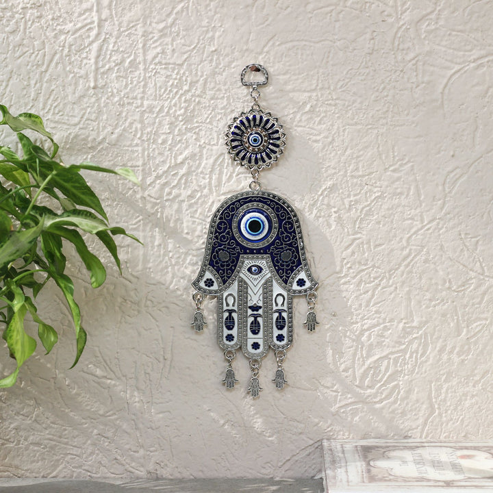 hamsa Turkish evil eye made of blue glass and metal