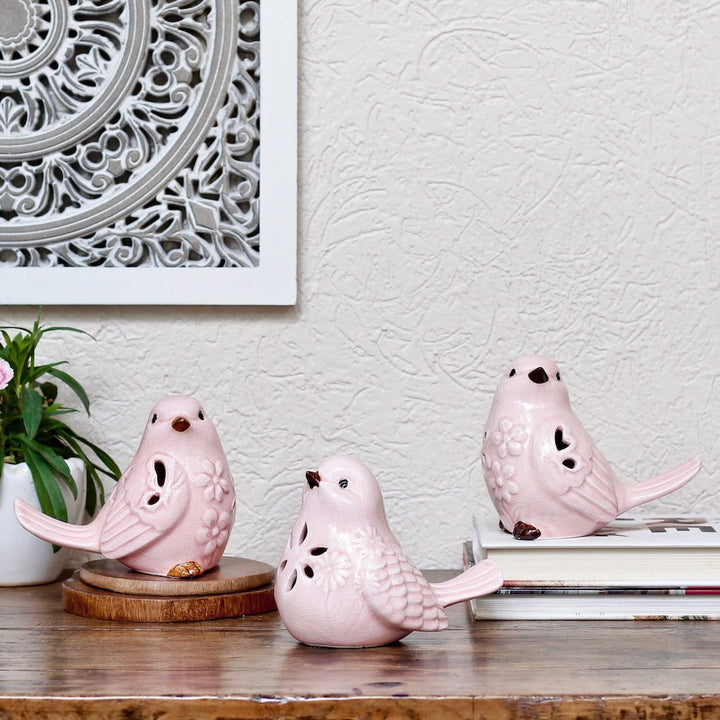 pink ceramic birds showpiece