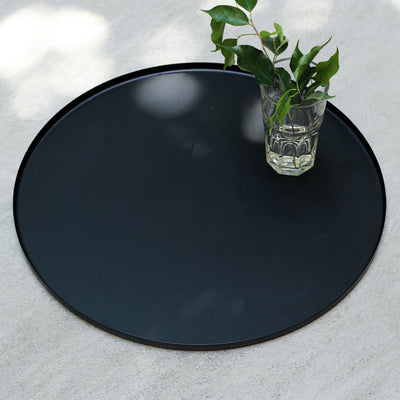 black round metal tray