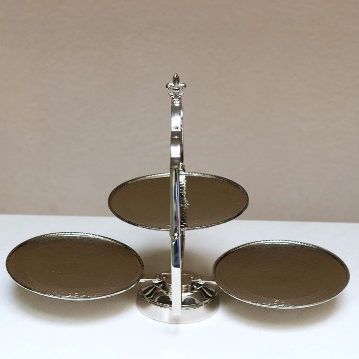 tiered serving platter made of stainless steel and brass