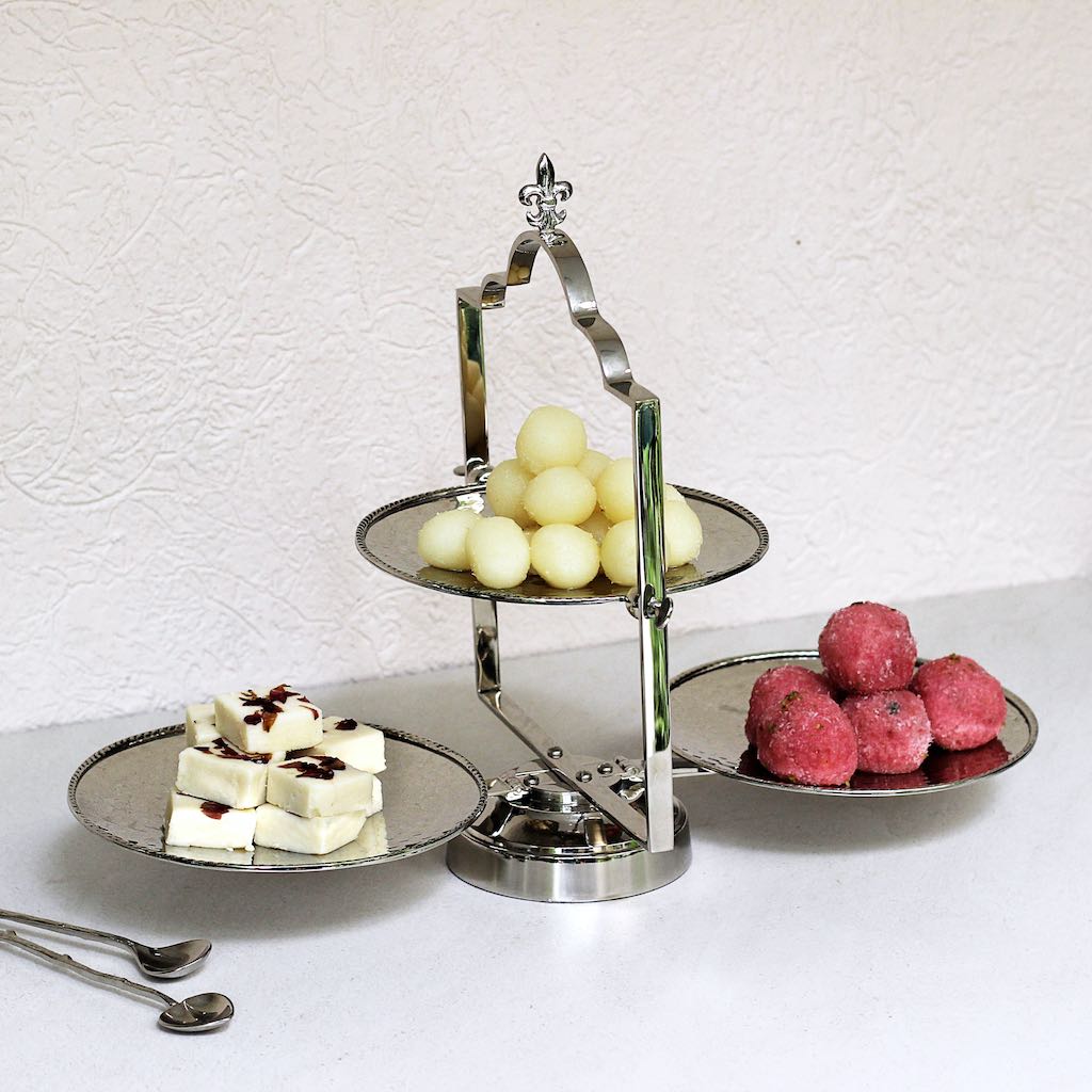 tiered serving platter made of stainless steel and brass
