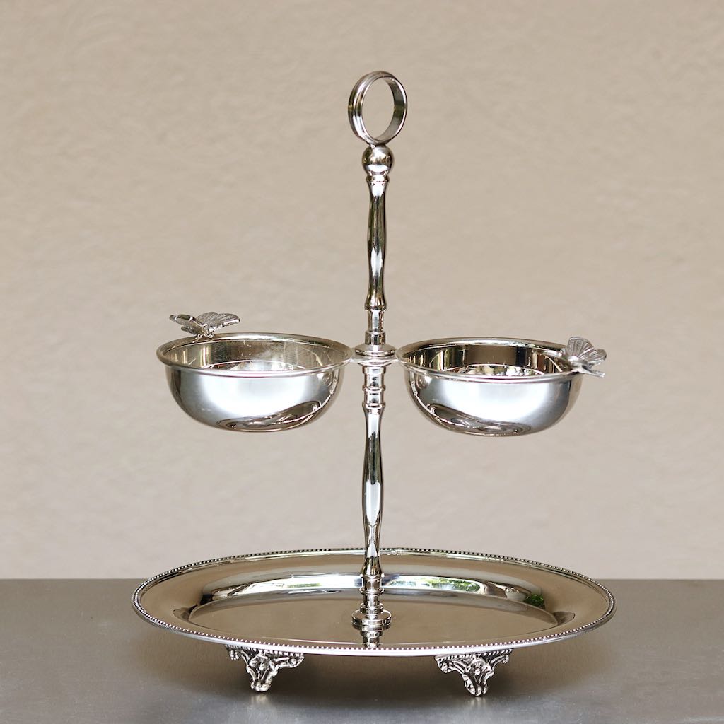 tiered serving platter made of stainless steel and brass