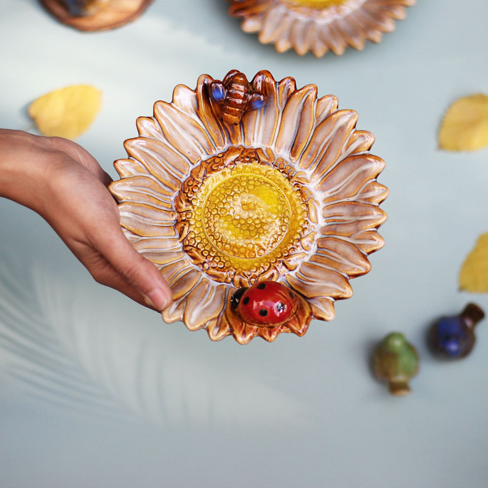 ceramic dish with a sunflower design
