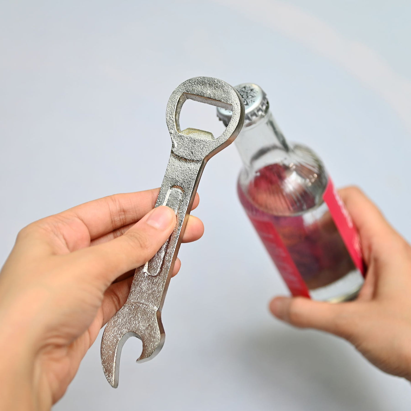 metal wrench shaped bottle opener