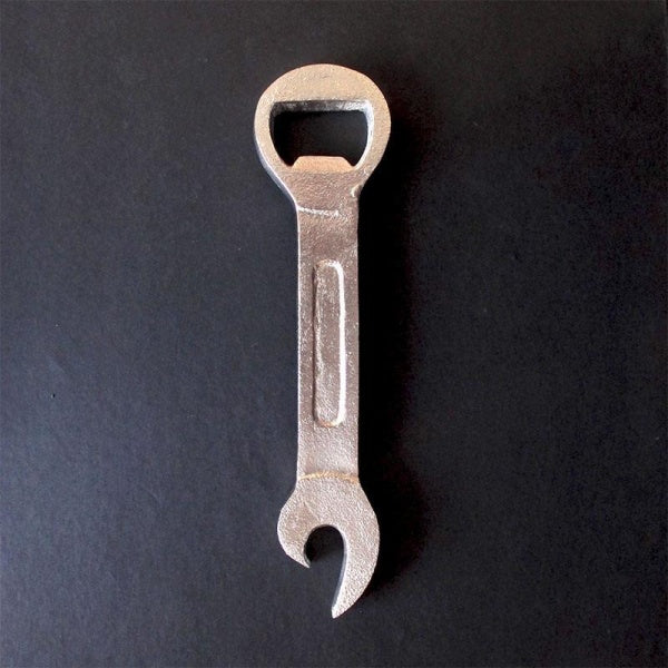 metal wrench shaped bottle opener