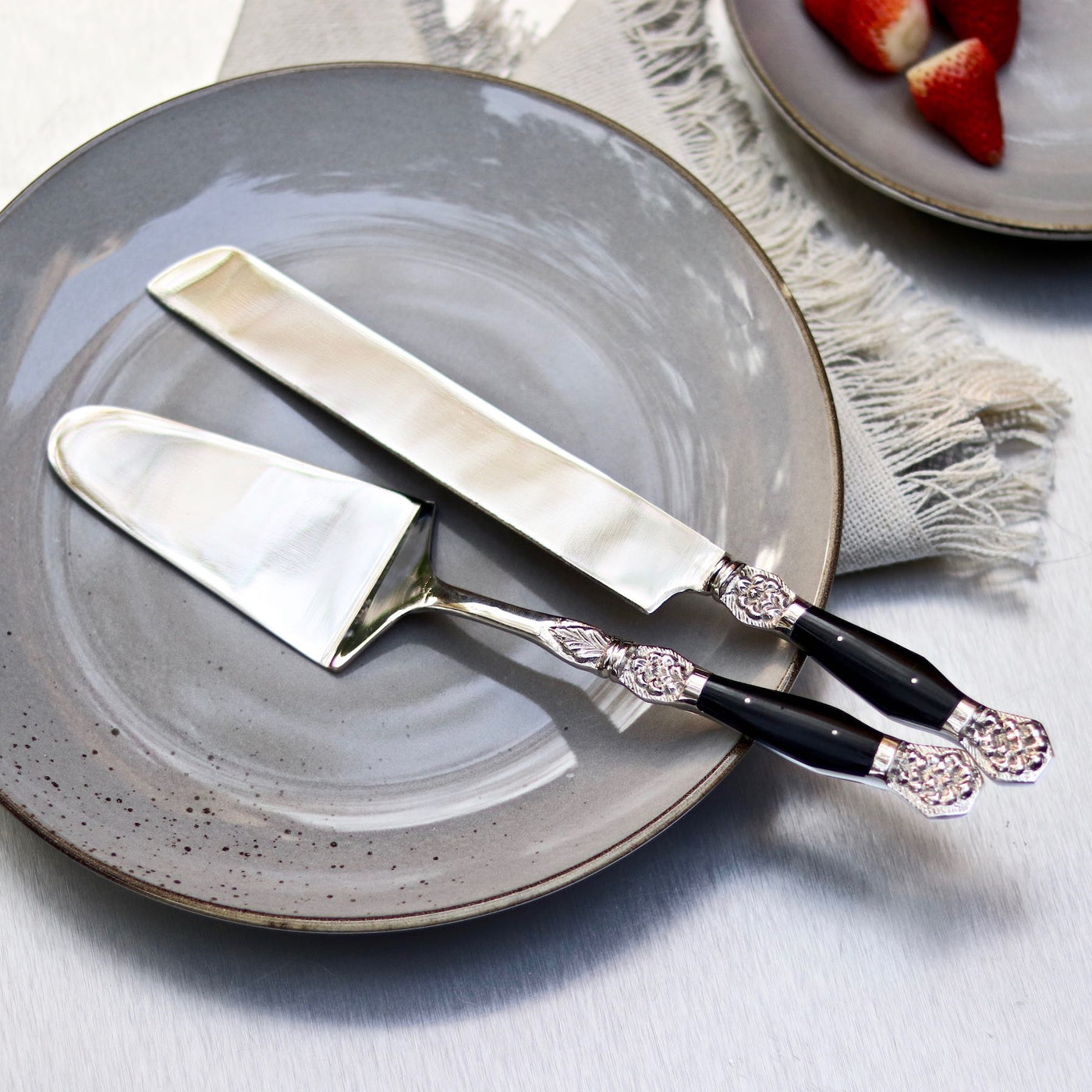 cake server and knife set with black inlay handles