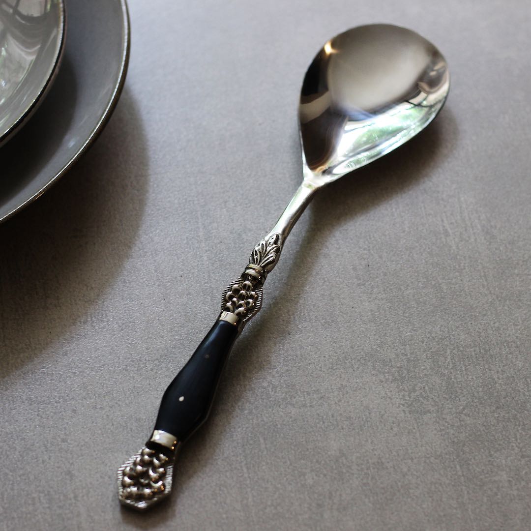 serving spoon with black inlay handles