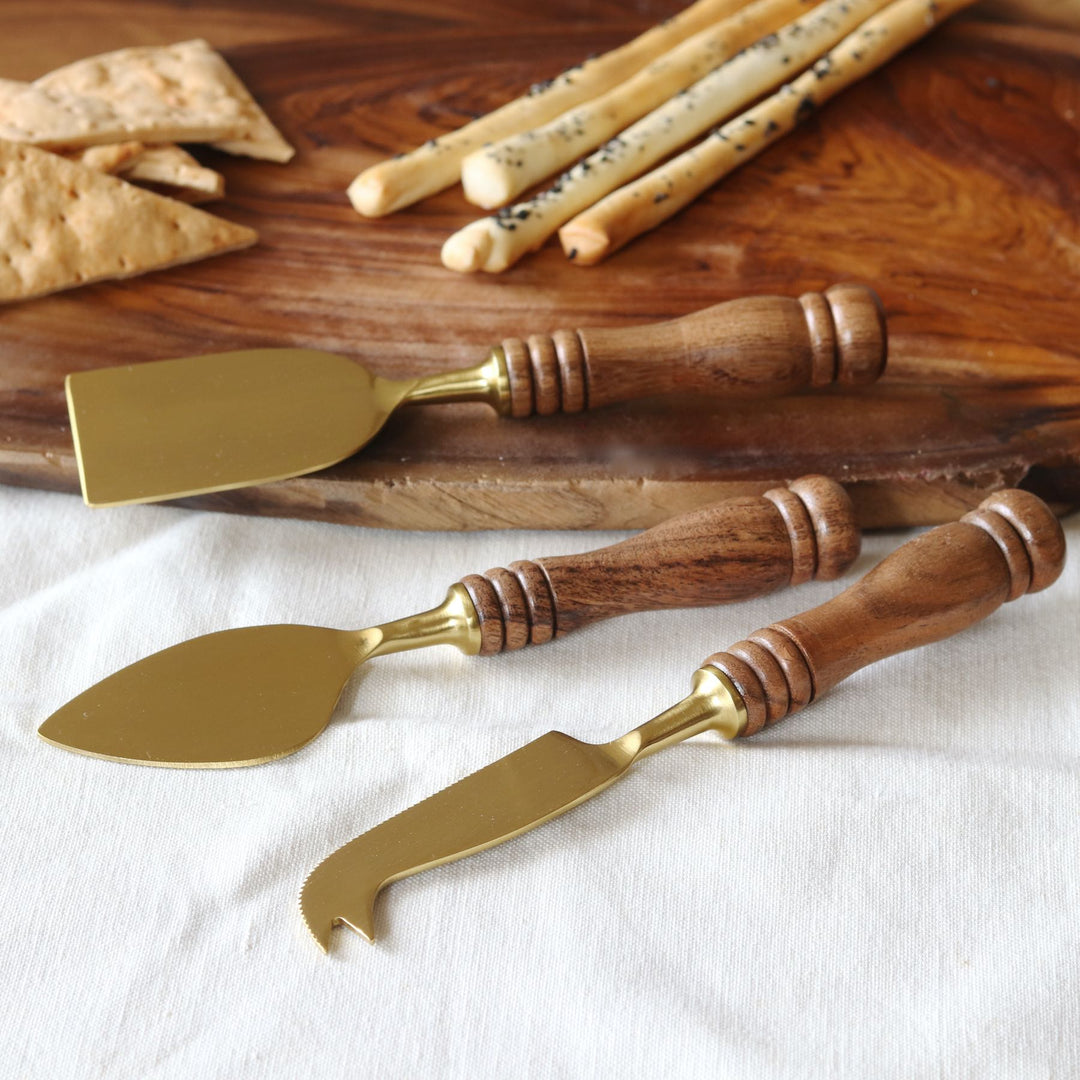 matte gold colour cheese knives set with wooden handles